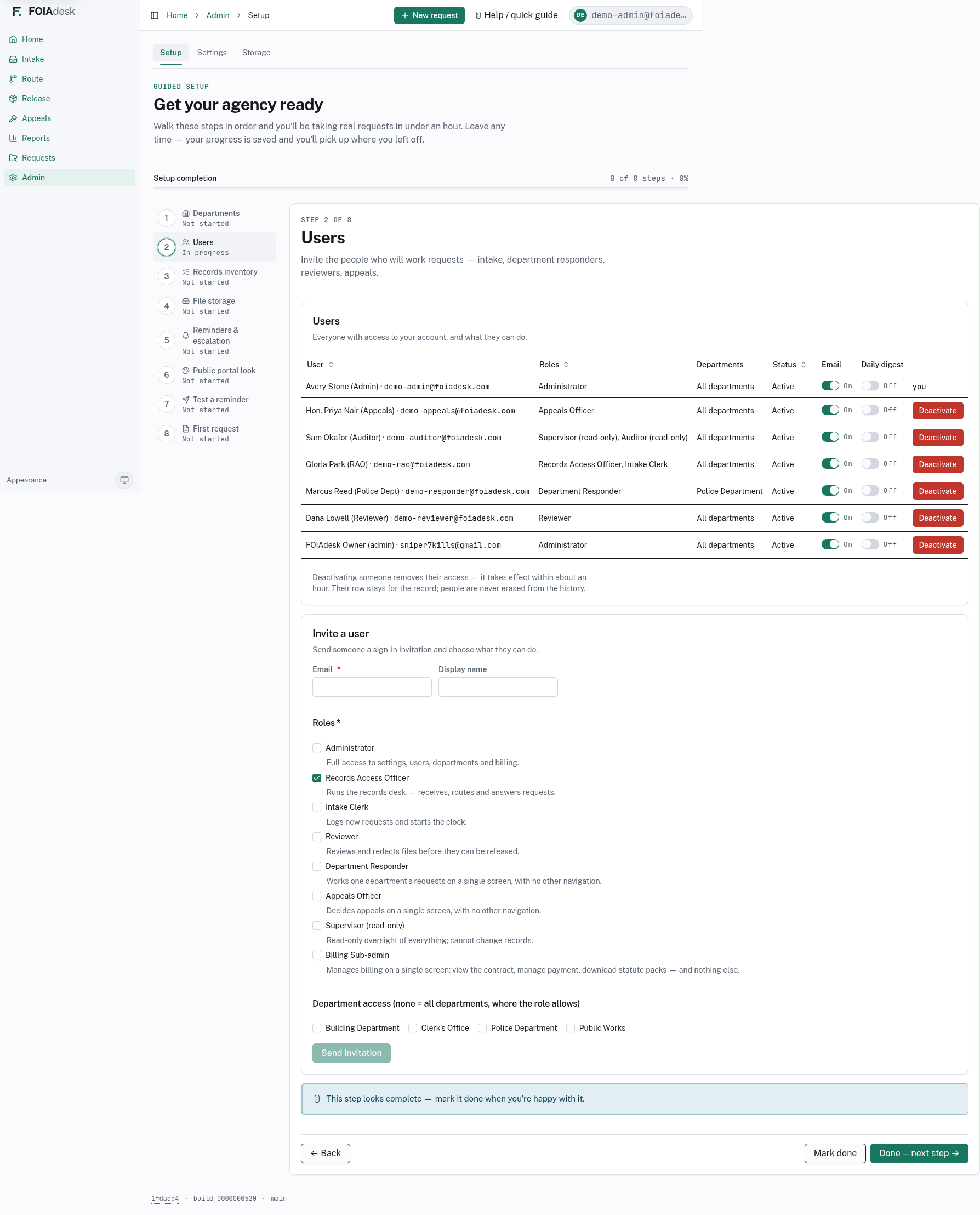 Step 2 of the guided Setup checklist: inviting staff and assigning each one a role.